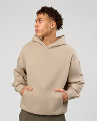 Man wearing Base Oversized Hoodie - Shale Beige | Model:Leandro | Size:M | | Thumbnail Index: 0