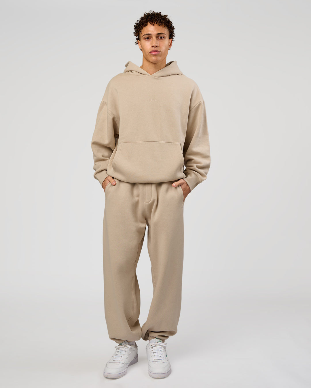 Man wearing Base Oversized Hoodie - Shale Beige | Model:Leandro | Size:M | - view 10