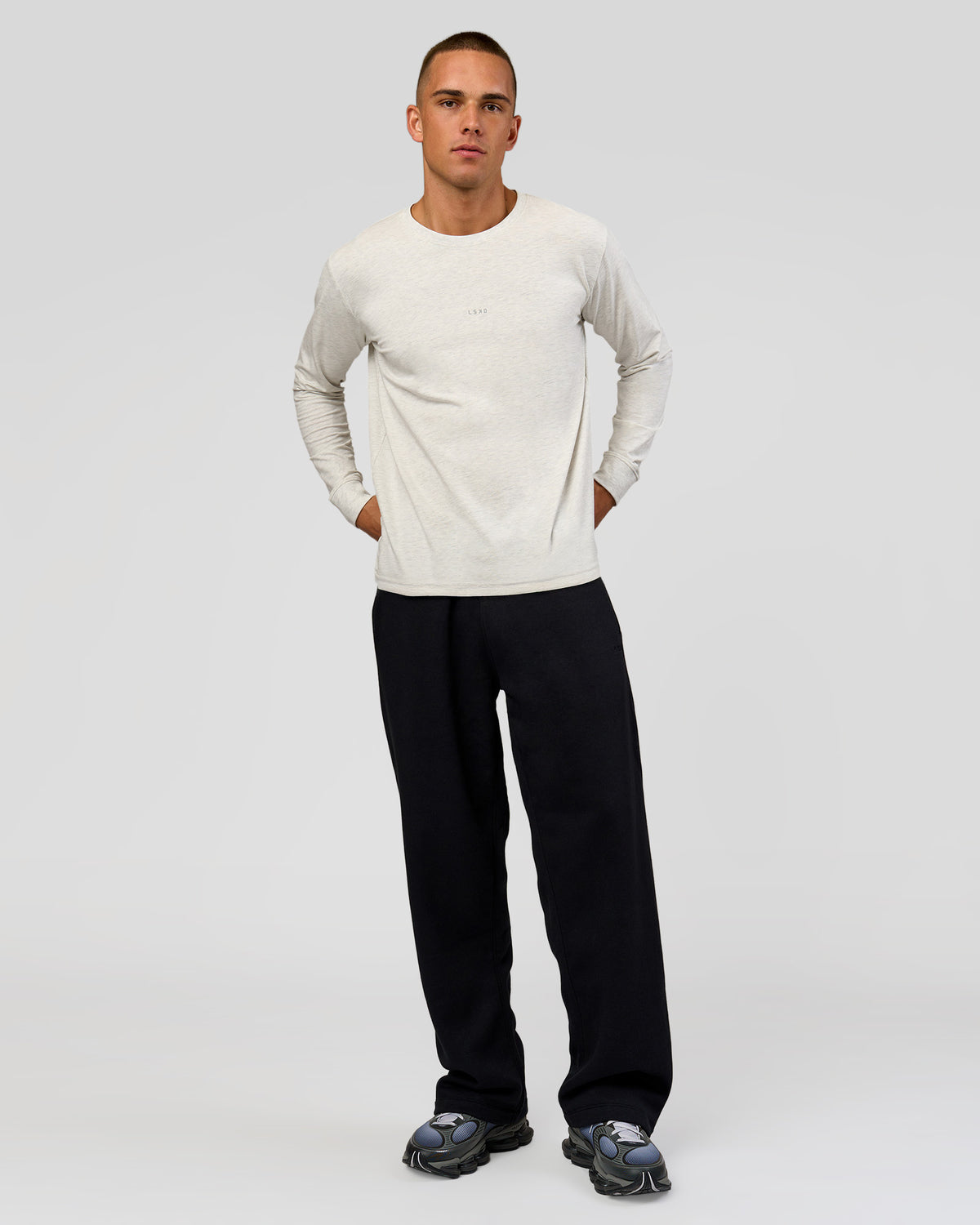 Man wearing Base Wide Leg Track Pant - Black | Model:Albert | Size:M |