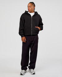 Man wearing Base Zip Through Oversized Hoodie - Black | Model:Malebo | Size:M | Thumbnail Index: 5