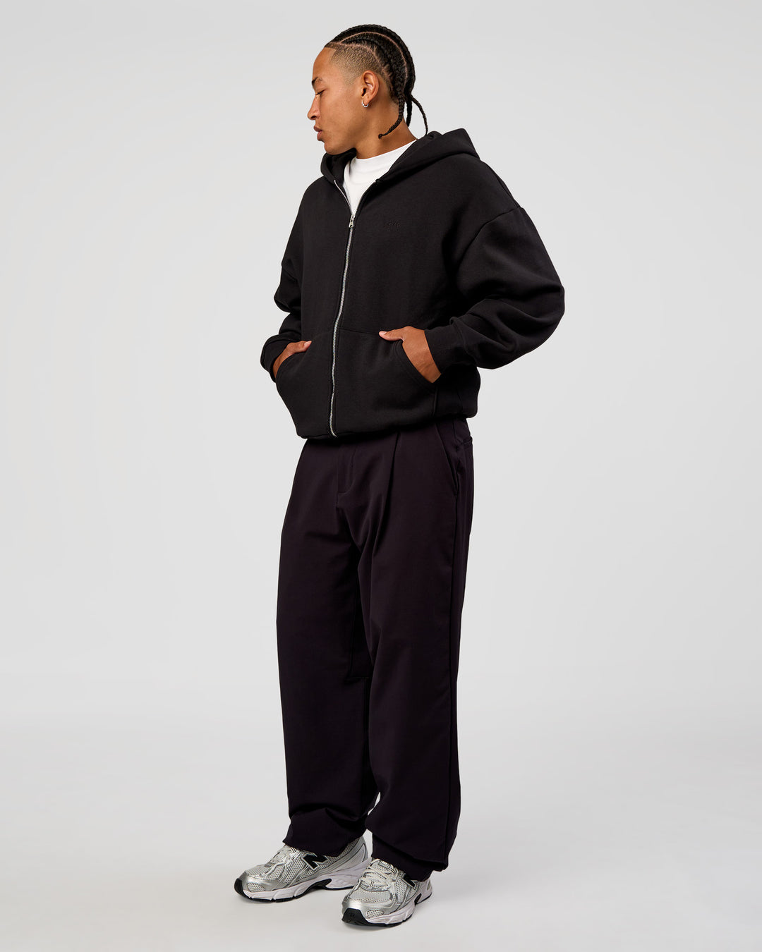 Man wearing Base Zip Through Oversized Hoodie - Black | Model:Malebo | Size:M - view 4