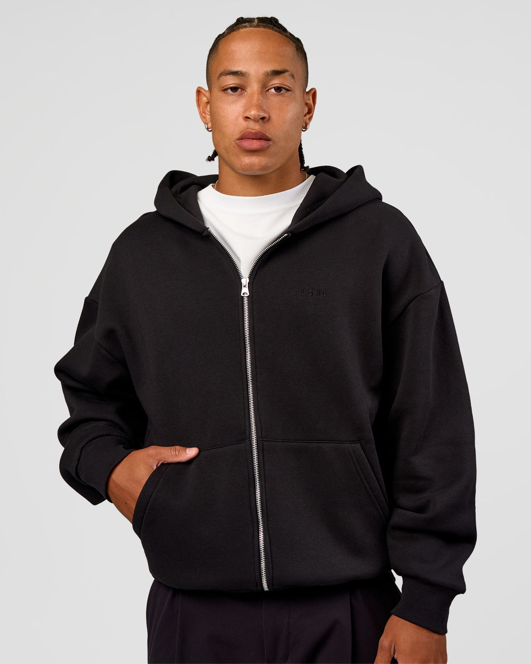 Man wearing Base Zip Through Oversized Hoodie - Black | Model:Malebo | Size:M - view 1