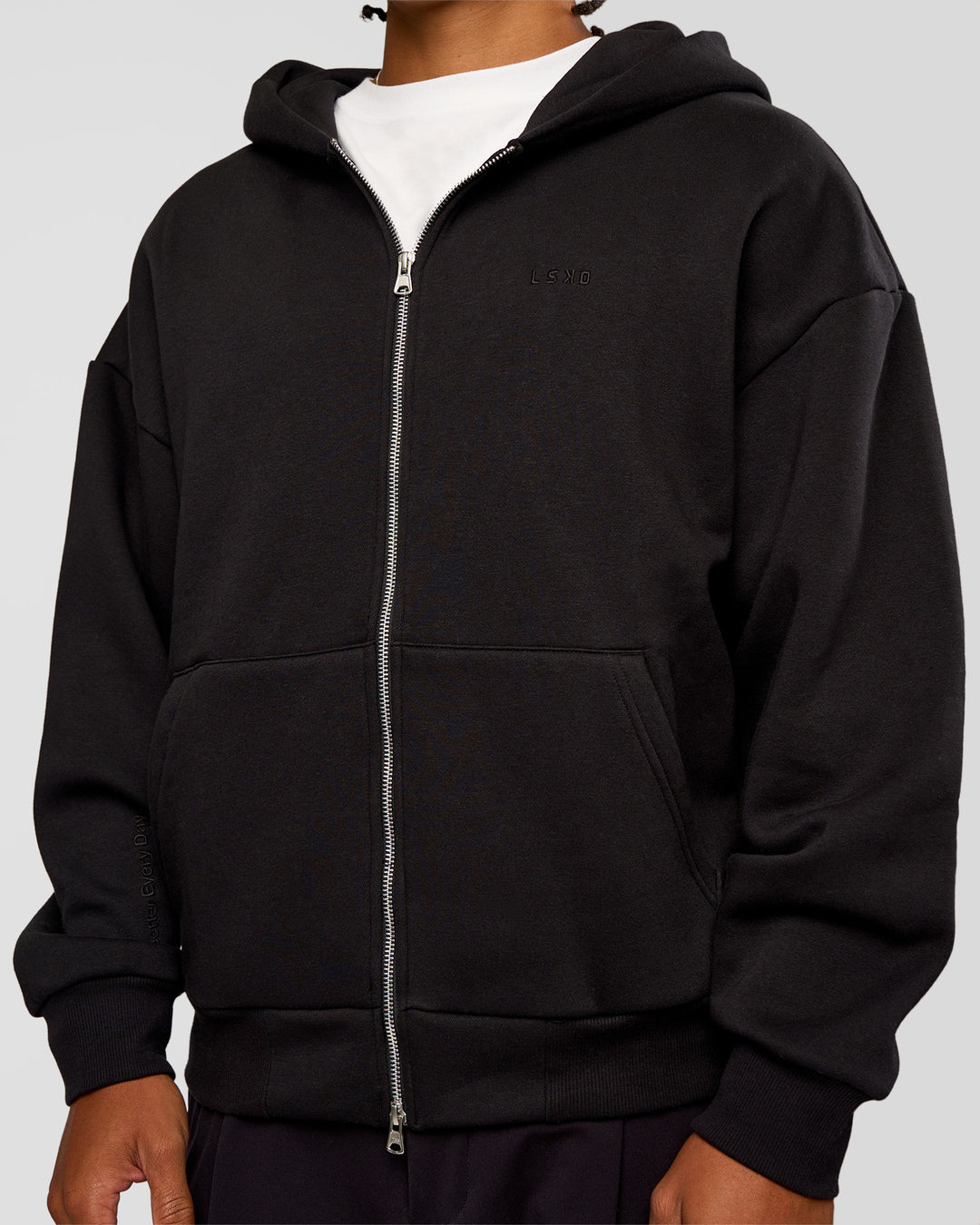 Man wearing Base Zip Through Oversized Hoodie - Black | Model:Malebo | Size:M - view 10