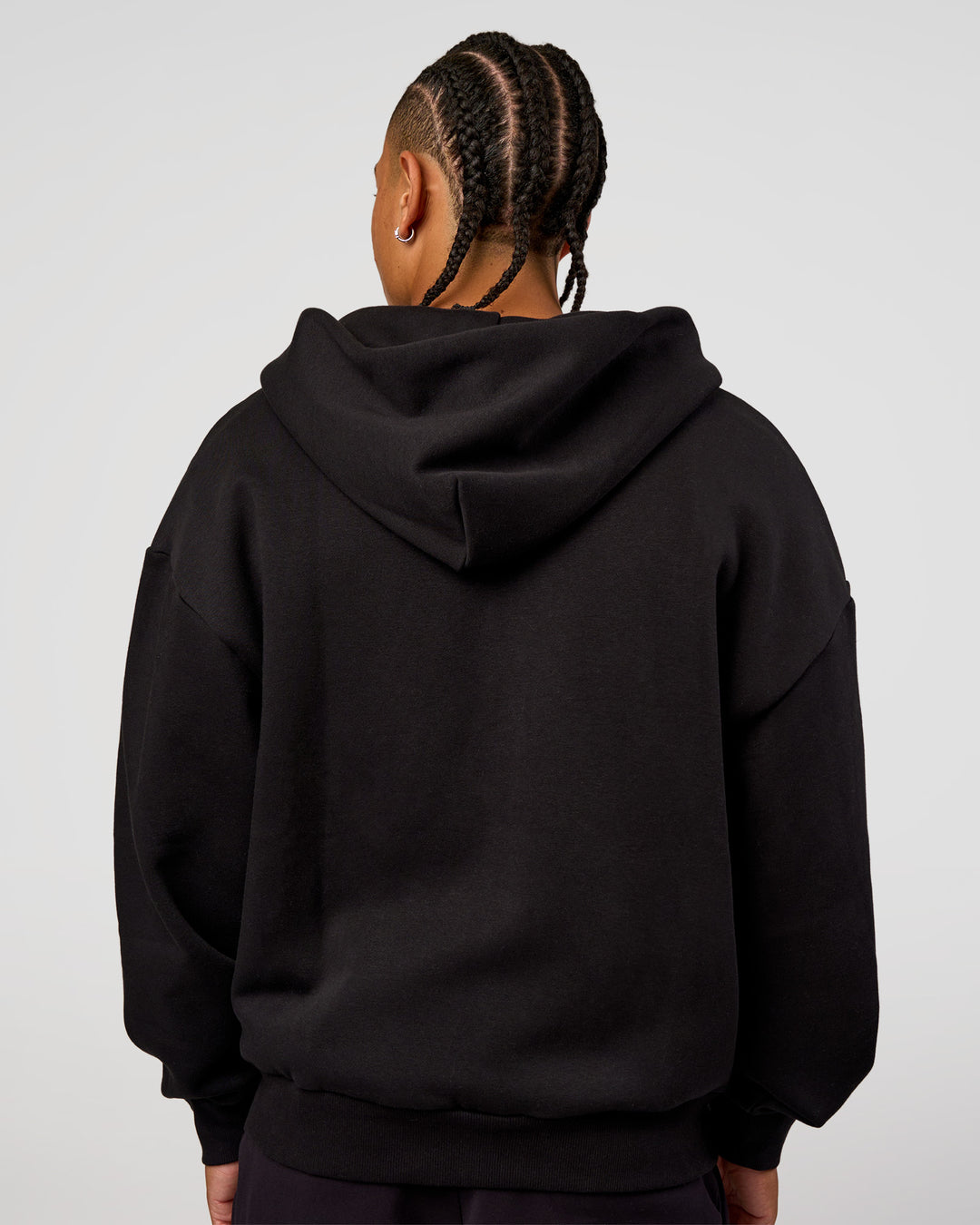 Man wearing Base Zip Through Oversized Hoodie - Black | Model:Malebo | Size:M - view 7