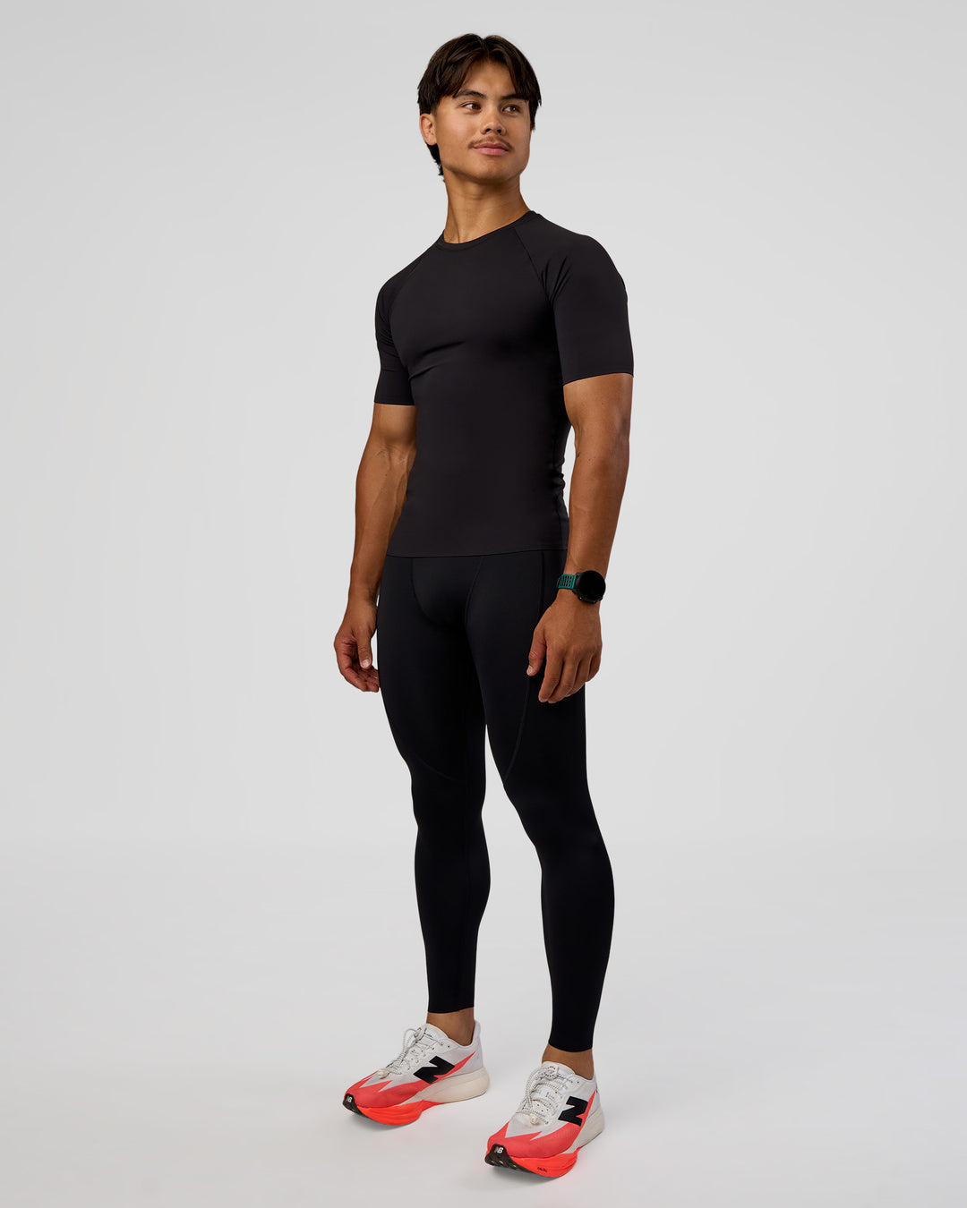 Man wearing BaseTech 26" Leggings - Black | Model:George | Size:M - view 8