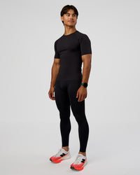 Man wearing BaseTech 26" Leggings - Black | Model:George | Size:M | Thumbnail Index: 7