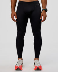 Man wearing BaseTech 26" Leggings - Black | Model:George | Size:M | Thumbnail Index: 6