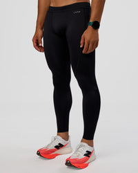 Man wearing BaseTech 26" Leggings - Black | Model:George | Size:M | Thumbnail Index: 0