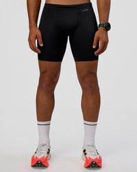 Man wearing BaseTech 8" Shorts - Black | Model:George | Size:M | Thumbnail Index: 1
