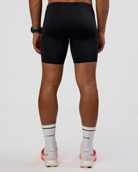 Man wearing BaseTech 8" Shorts - Black | Model:George | Size:M | Thumbnail Index: 4