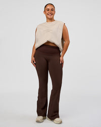 Model wearing CF Fold Over High-Rise Flared Legging - Hot Chocolate | Model:Simmy | Size:M | Thumbnail Index: 2