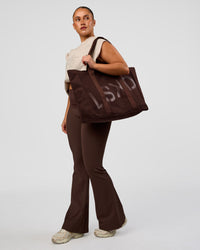 Model wearing CF Fold Over High-Rise Flared Legging - Hot Chocolate | Model:Simmy | Size:M | Thumbnail Index: 3