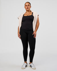 Woman wearing CF Fold Over High-Rise Full Length Legging - Black | Model:Simmy | Size:M | Thumbnail Index: 3