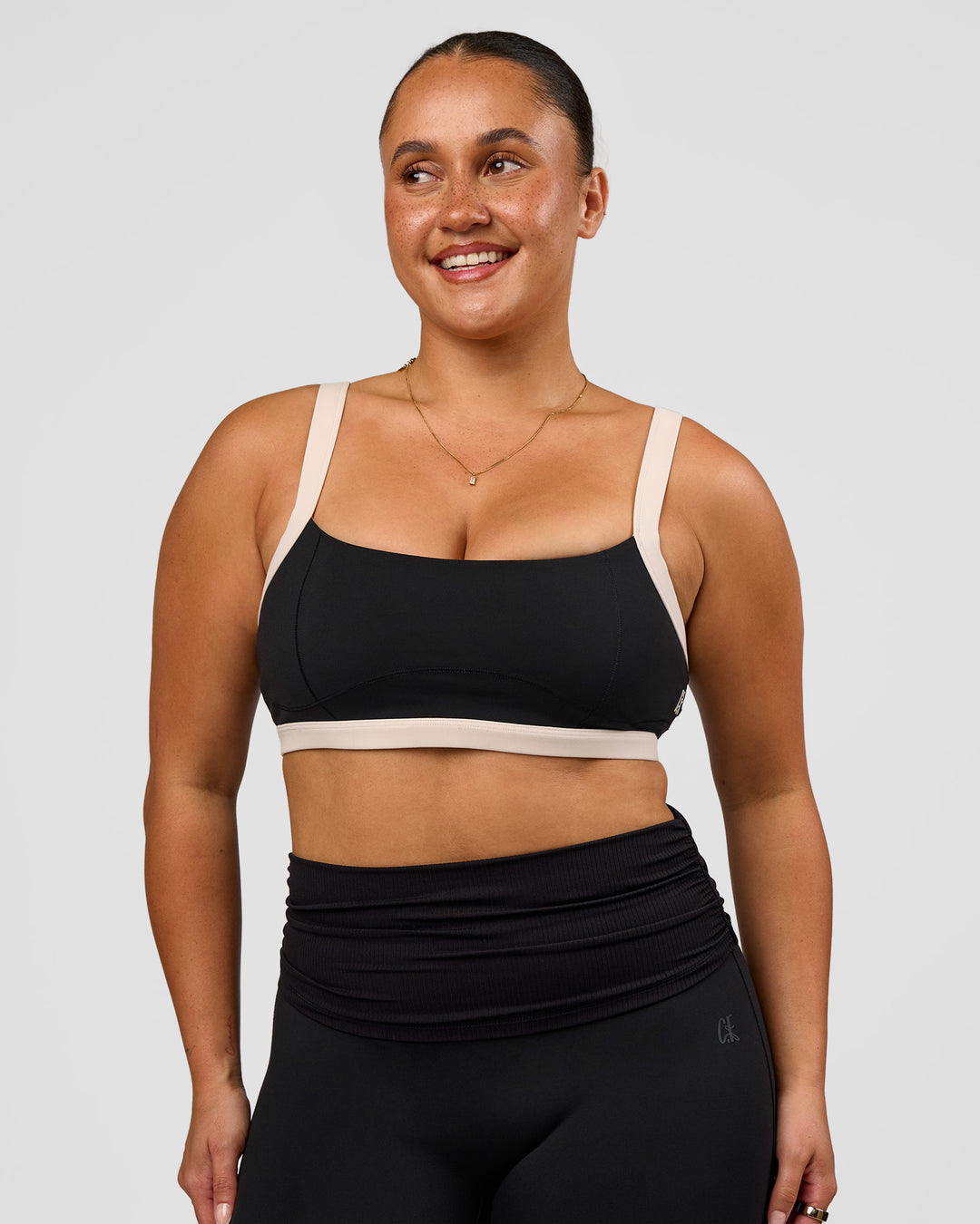 Woman wearing CF Move Through It Sports Bra - Black-Clay | Model:Simmy | Size:M - view 4