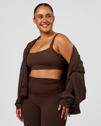 Woman wearing CF Move Through It Sports Bra - Hot Chocolate | Model:Simmy | Size:M | Thumbnail Index: 4