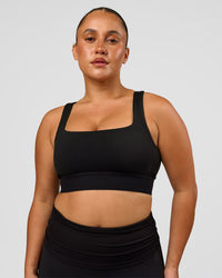 Woman wearing CF Train Hard Sports Bra - Black | Model:Simmy | Size:M | Thumbnail Index: 7