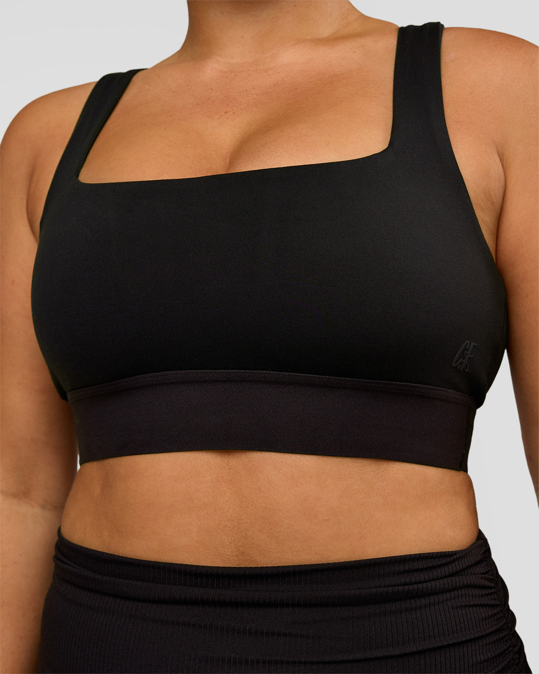 Woman wearing CF Train Hard Sports Bra - Black | Model:Simmy | Size:M - view 2