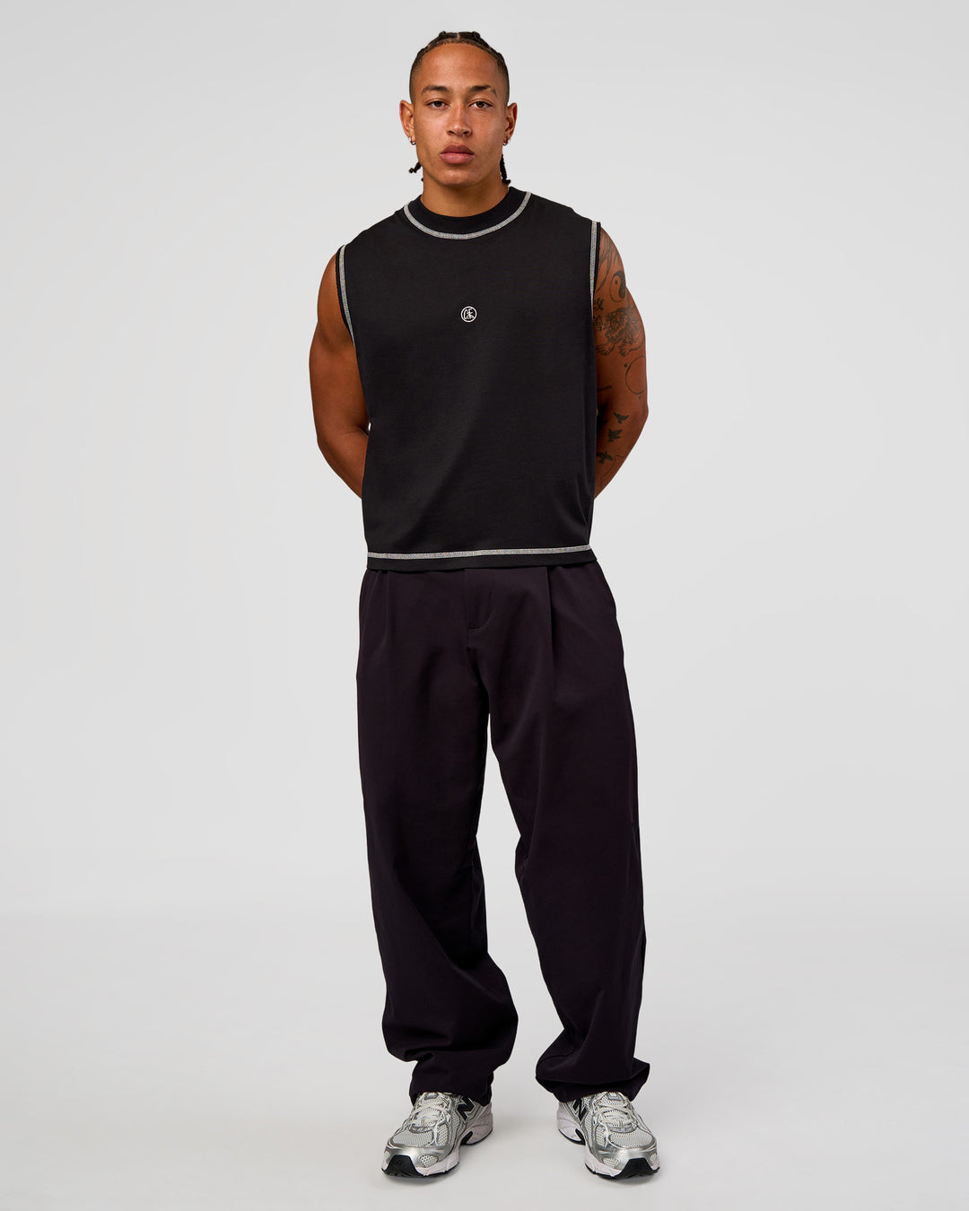 Man wearing CF Unisex Oversized Heavyweight Boxed Tank - Black-CF X LSKD Sport | Model:Malebo | Size:M - view 9