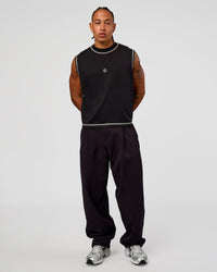Man wearing CF Unisex Oversized Heavyweight Boxed Tank - Black-CF X LSKD Sport | Model:Malebo | Size:M | Thumbnail Index: 8