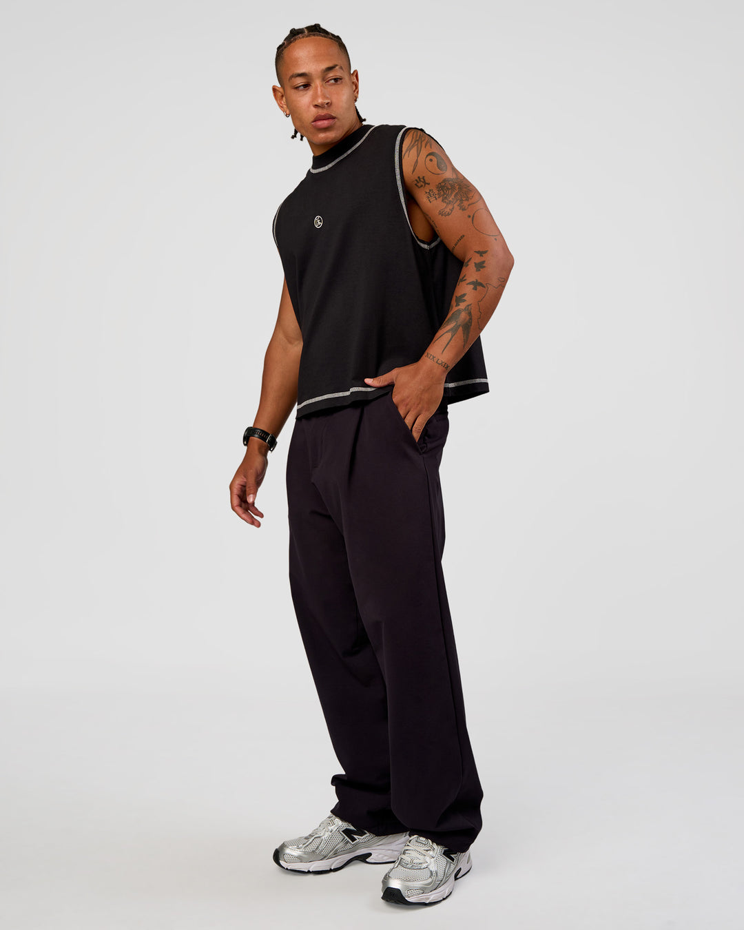 Man wearing CF Unisex Oversized Heavyweight Boxed Tank - Black-CF X LSKD Sport | Model:Malebo | Size:M - view 4