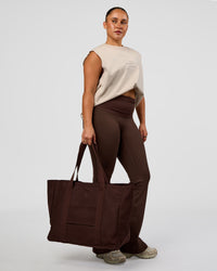 Woman wearing CF Unisex Oversized Heavyweight Boxed Tank - Clay-CF Move Through It | Model:Simmy | Size:M | Thumbnail Index: 4