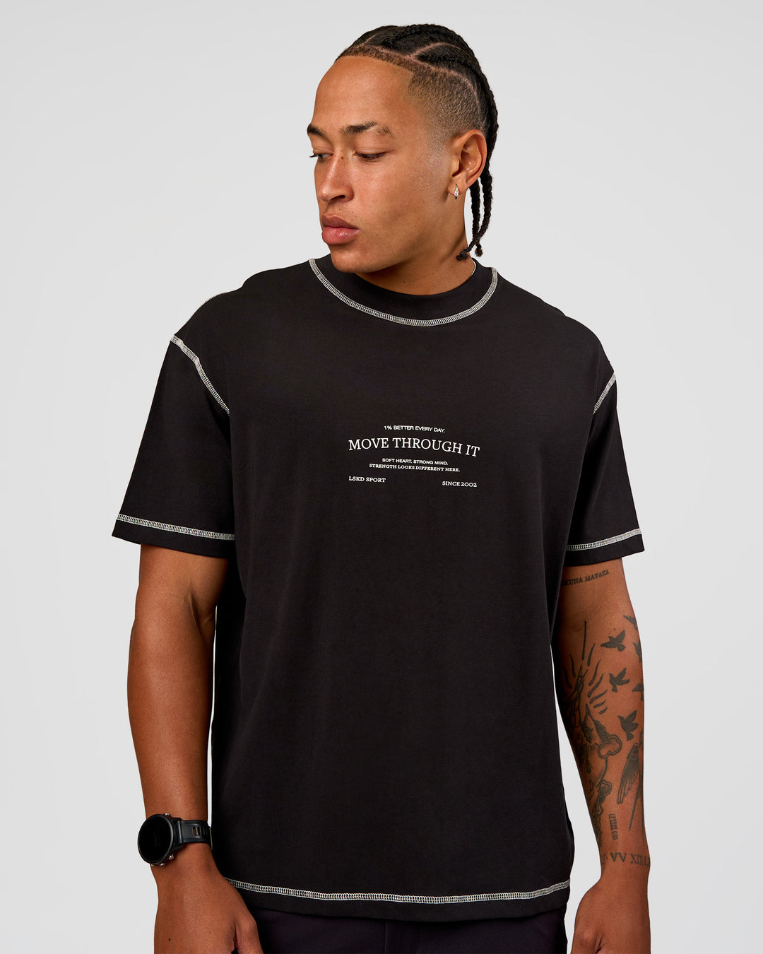 Man wearing CF Unisex Oversized Heavyweight FLXCotton Tee - Black-CF Move Through It | Model:Malebo | Size:M - view 6
