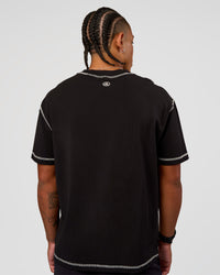 Man wearing CF Unisex Oversized Heavyweight FLXCotton Tee - Black-CF Move Through It | Model:Malebo | Size:M | Thumbnail Index: 1