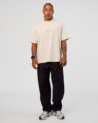 Man wearing CF Unisex Oversized Heavyweight FLXCotton Tee - Clay-CF X LSKD Sport | Model:Malebo | Size:M | Thumbnail Index: 2