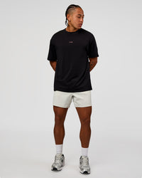 Man wearing CFT BNE 26 FLXCotton Oversized Tee in Black | Model:Malebo | Size:M | Thumbnail Index: 3
