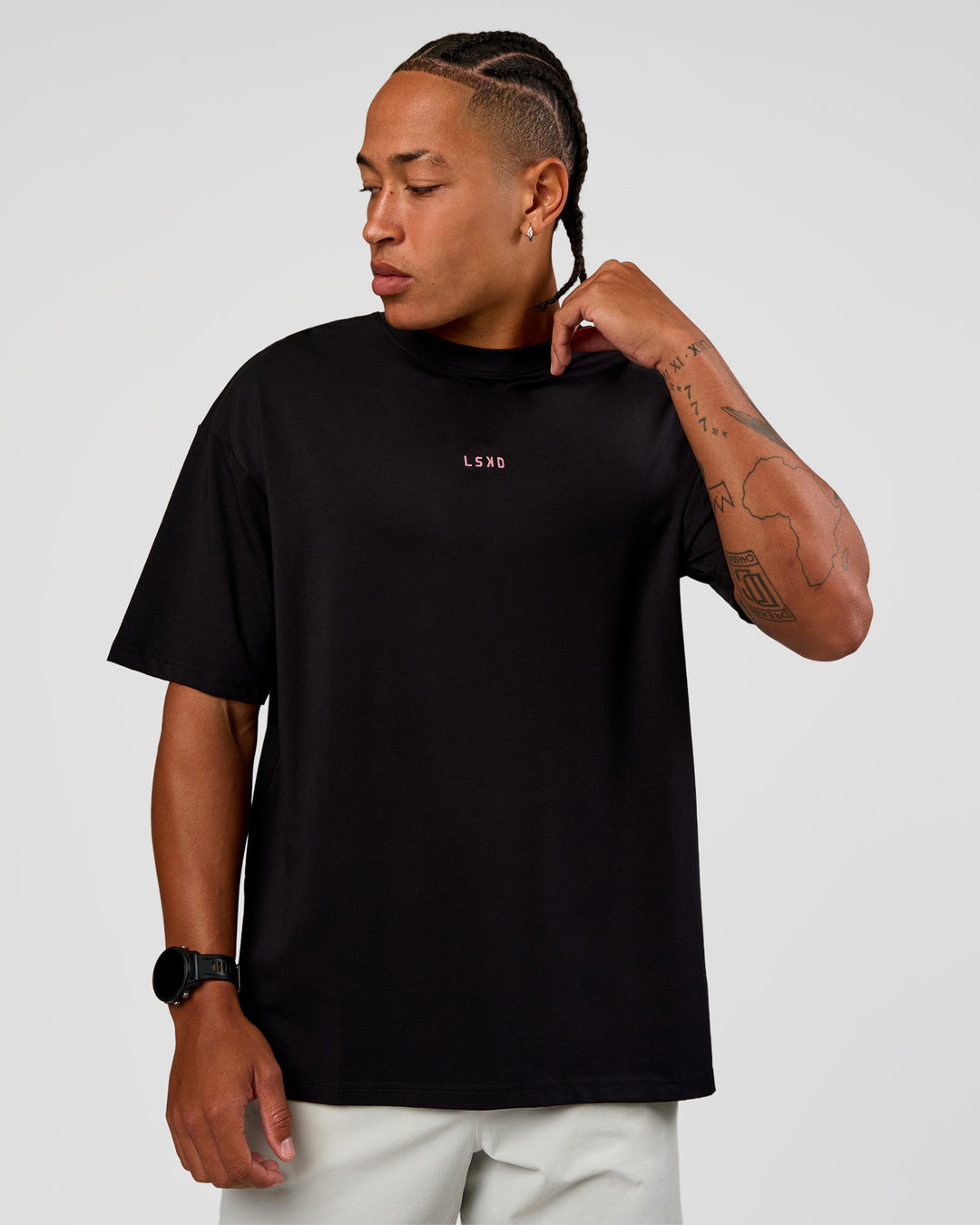 Man wearing CFT BNE 26 FLXCotton Oversized Tee in Black | Model:Malebo | Size:M - view 6