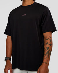 Man wearing CFT BNE 26 FLXCotton Oversized Tee in Black | Model:Malebo | Size:M | Thumbnail Index: 2