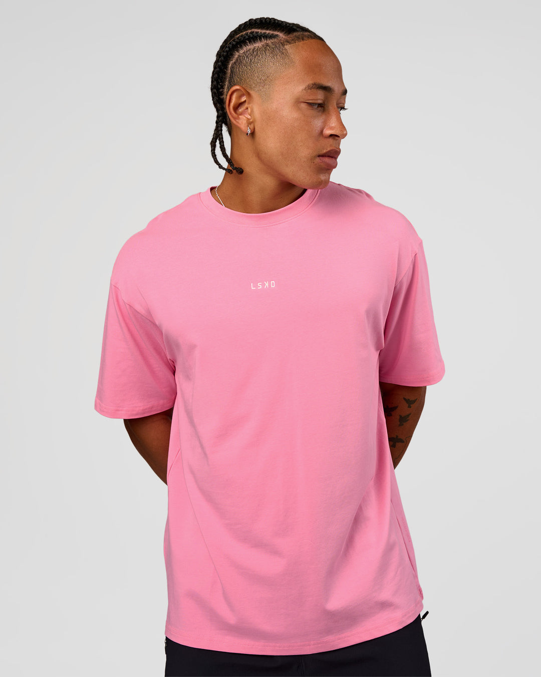 Man wearing CFT BNE 26 FLXCotton Oversized Tee in Candy Pink | Model:Malebo | Size:M - view 8