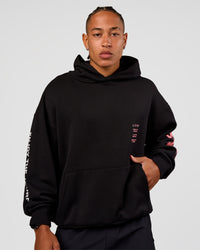 Man wearing CFT BNE 26 Unisex Oversized Hoodie - Black-Candy Pink | Model:Malebo | Size:M | Thumbnail Index: 5