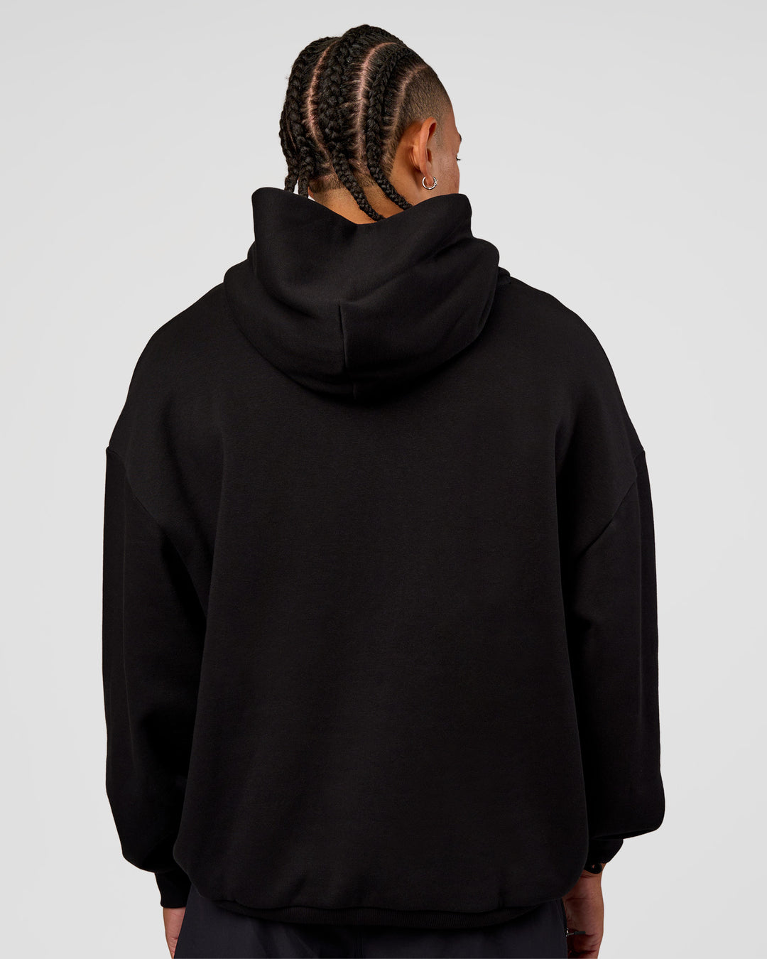 Man wearing CFT BNE 26 Unisex Oversized Hoodie - Black-Candy Pink | Model:Malebo | Size:M - view 8