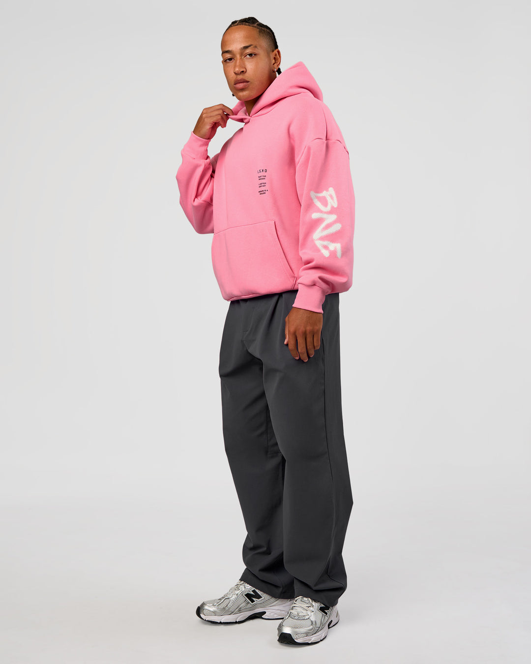 Man wearing CFT BNE 26 Unisex Oversized Hoodie - Candy Pink-Black | Model:Malebo | Size:M - view 11