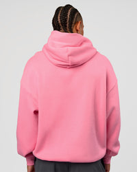 Man wearing CFT BNE 26 Unisex Oversized Hoodie - Candy Pink-Black | Model:Malebo | Size:M | Thumbnail Index: 2