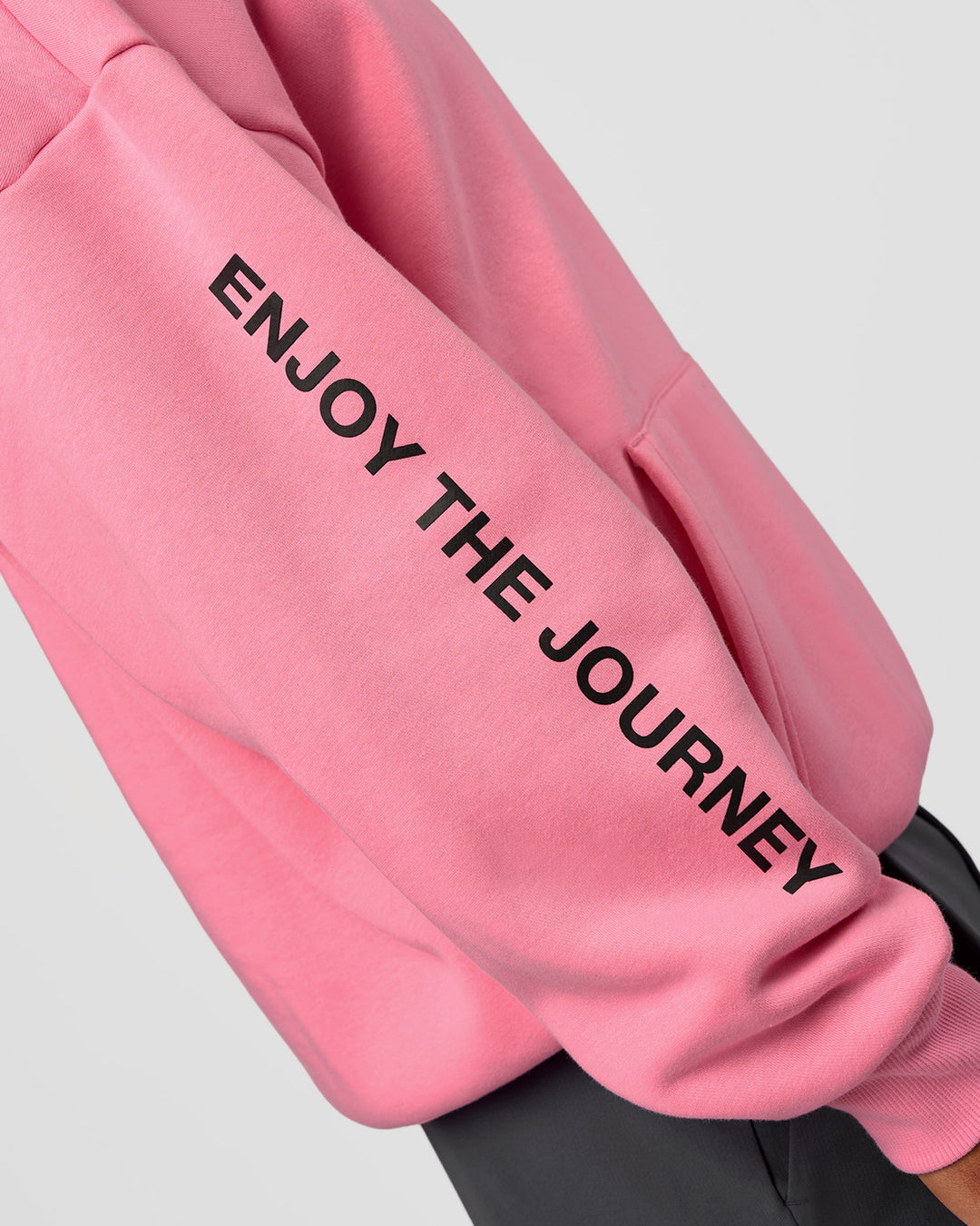 Man wearing CFT BNE 26 Unisex Oversized Hoodie - Candy Pink-Black | Model:Malebo | Size:M - view 2