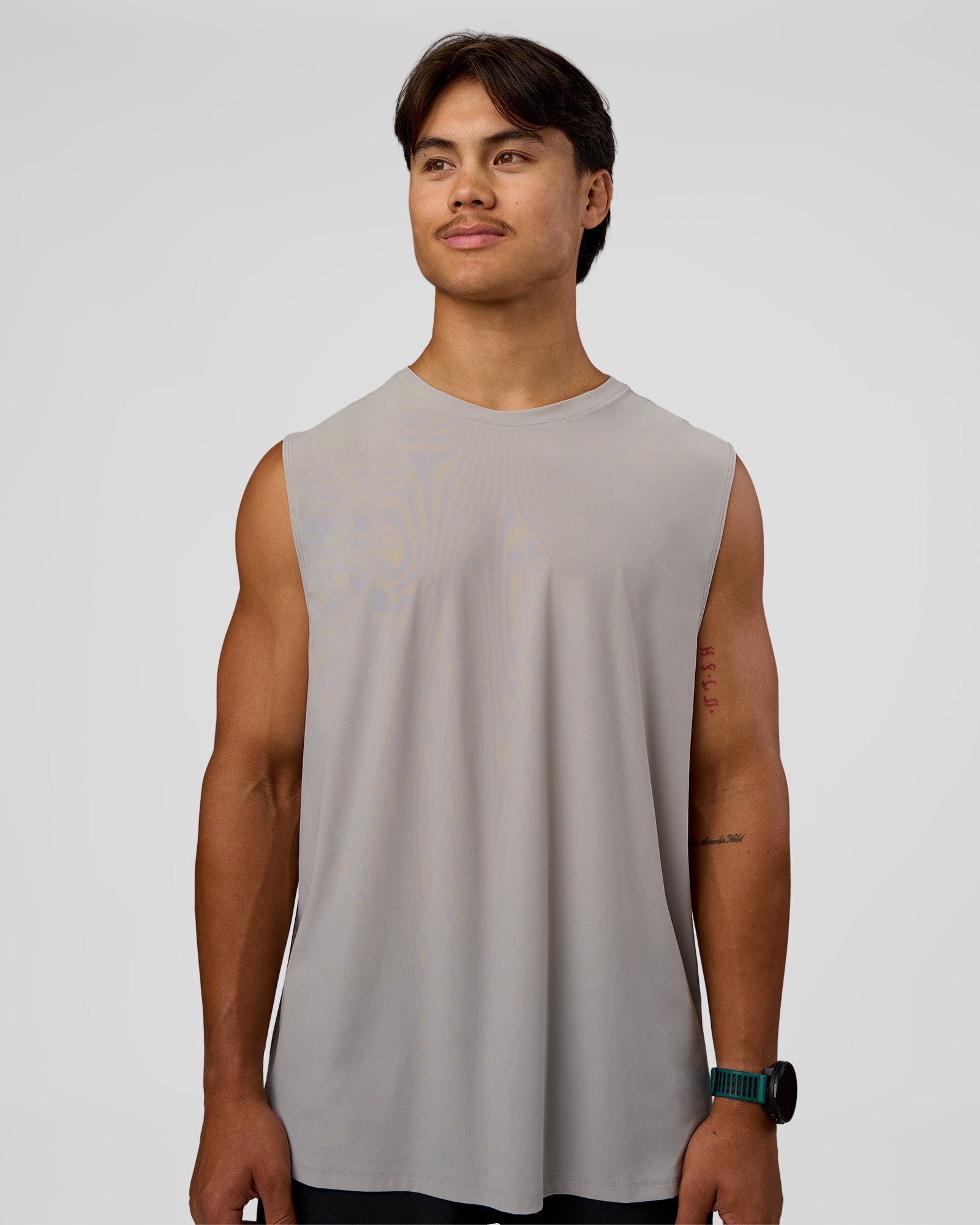 Man wearing Cadence MicroMotion Muscle Tank - Alloy-Carbon Green | Model:George | Size:M