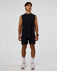 Man wearing Cadence MicroMotion Muscle Tank - Black-Blue Aura | Model:George | Size:M | Thumbnail Index: 4