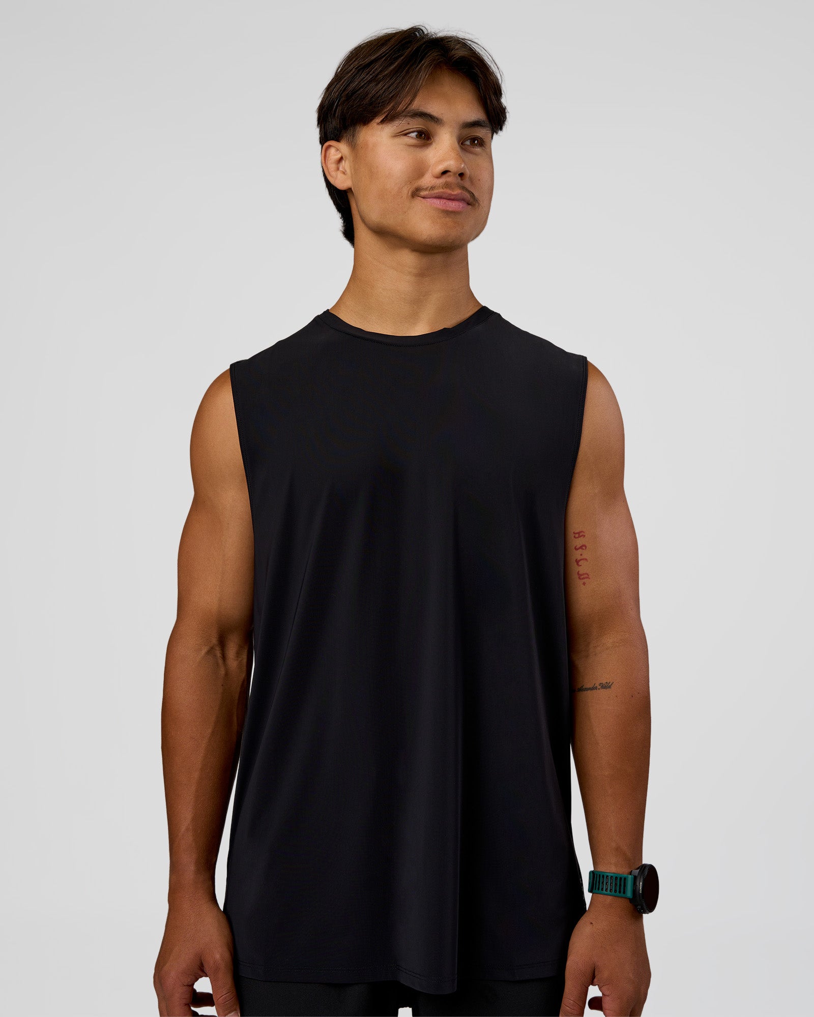 Man wearing Cadence MicroMotion Muscle Tank - Black-Blue Aura | Model:George | Size:M