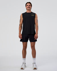 Man wearing Cadence RUN CLUB Muscle Tank - Black-Yellow Fizz | Model:Konnor | Size:M | Thumbnail Index: 5
