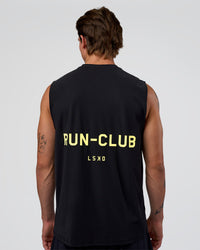 Man wearing Cadence RUN CLUB Muscle Tank - Black-Yellow Fizz | Model:Konnor | Size:M | Thumbnail Index: 0