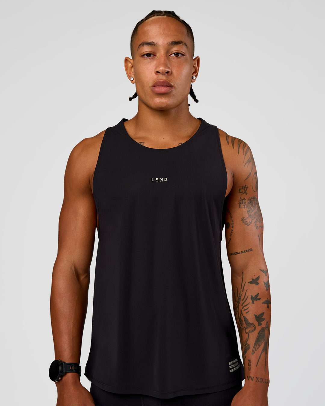 Man wearing Cadence Run Club Script Values Tank - Black-Alloy | Model:Malebo | Size:M - view 2