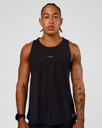 Man wearing Cadence Run Club Script Values Tank - Black-Alloy | Model:Malebo | Size:M | Thumbnail Index: 1