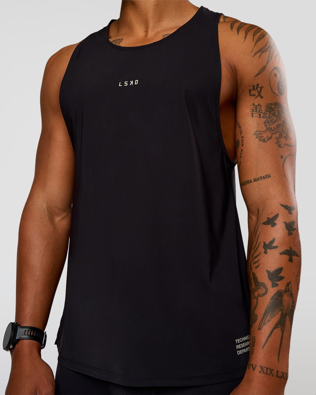 Man wearing Cadence Run Club Script Values Tank - Black-Alloy | Model:Malebo | Size:M - view 7