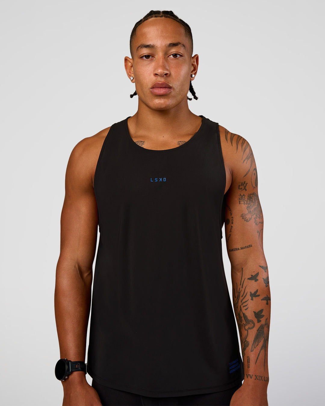 Man wearing Cadence Run Club Script Values Tank - Black-Palace Blue | Model:Malebo | Size:M - view 2