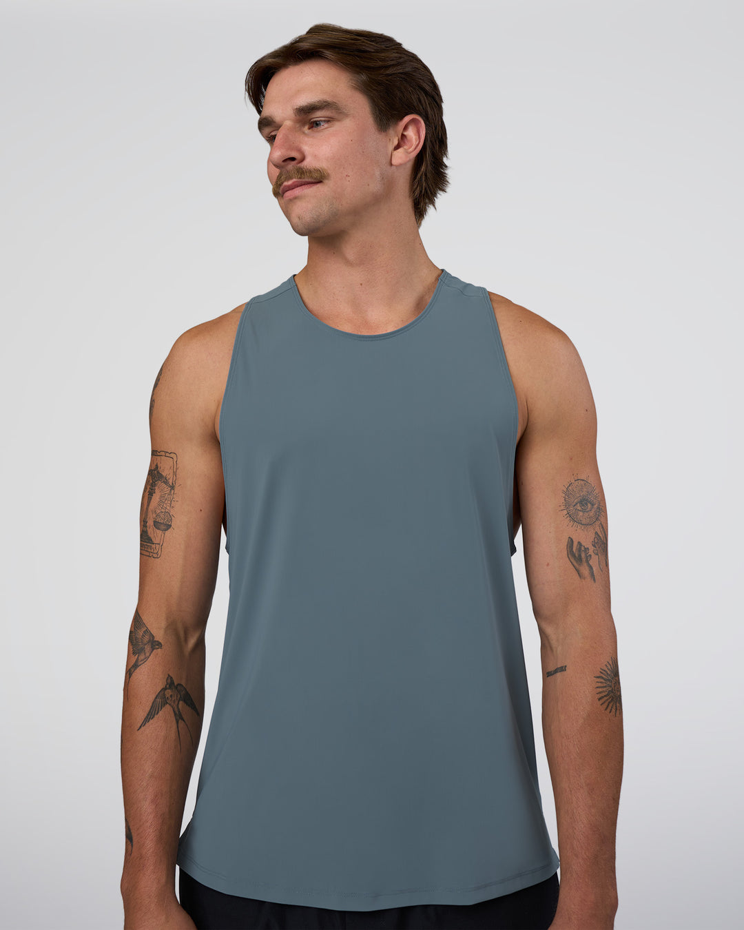 Man wearing Cadence Swift Tank - Blue Mirage | Model:Konnor | Size:M - view 1