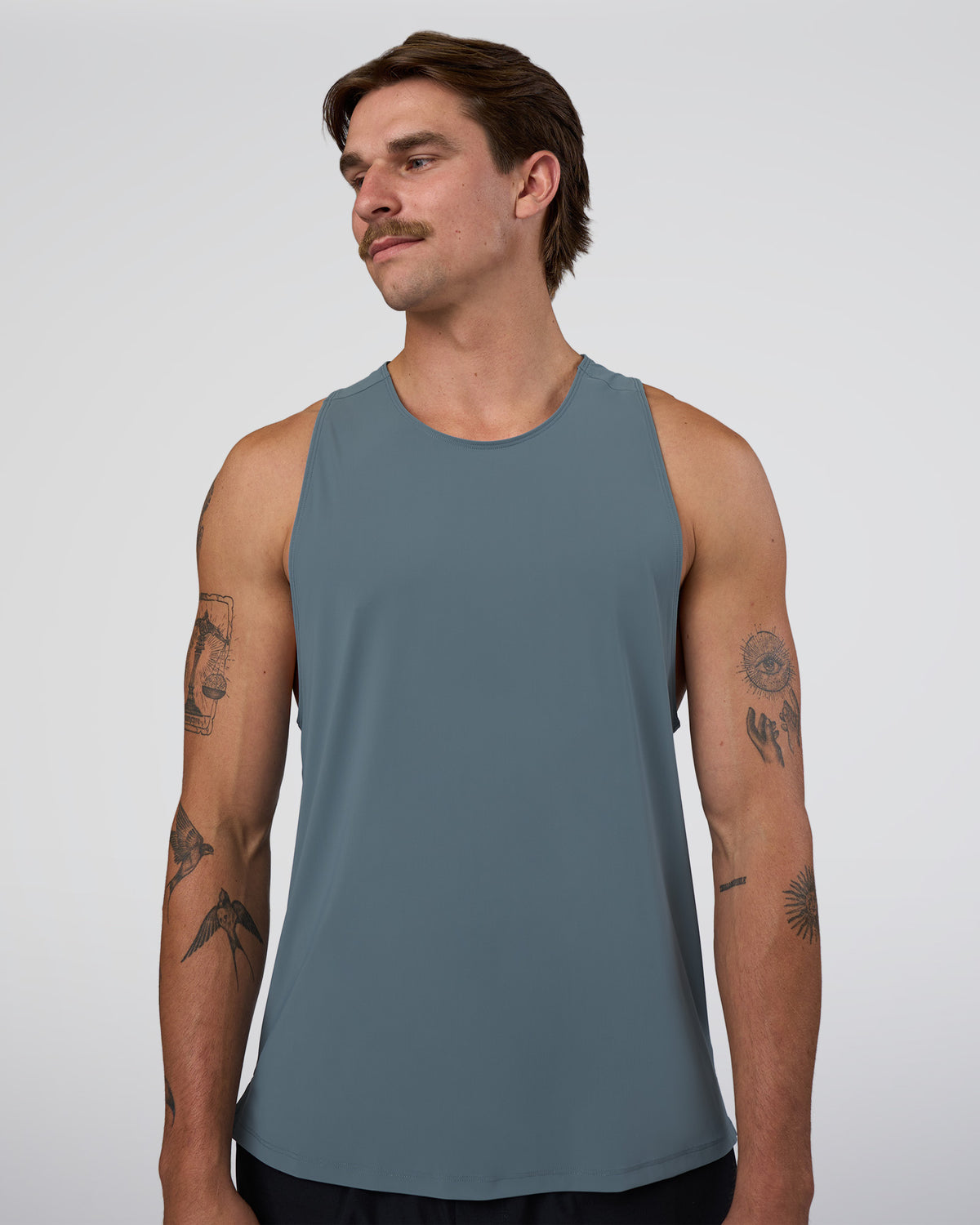 Man wearing Cadence Swift Tank - Blue Mirage | Model:Konnor | Size:M