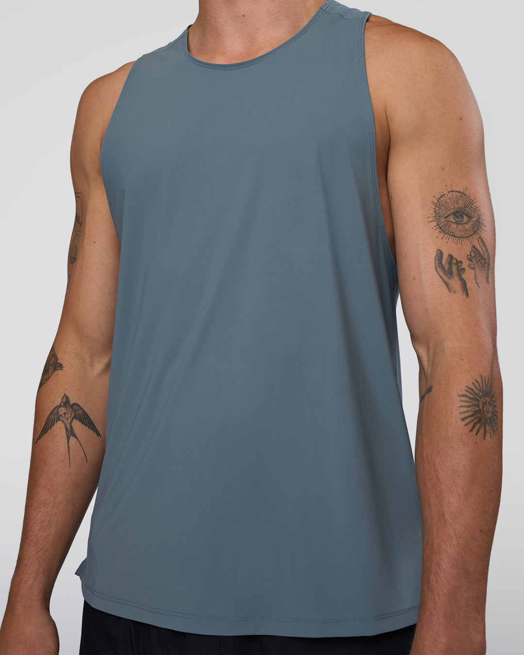 Man wearing Cadence Swift Tank - Blue Mirage | Model:Konnor | Size:M - view 4