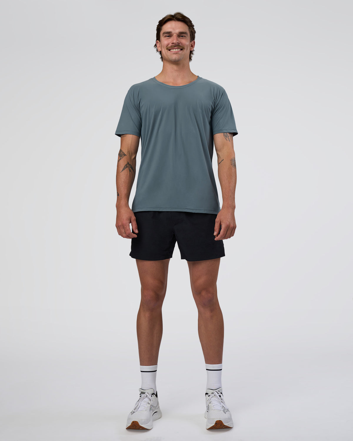 Man wearing Cadence Swift Tee - Blue Mirage | Model:Konnor | Size:M